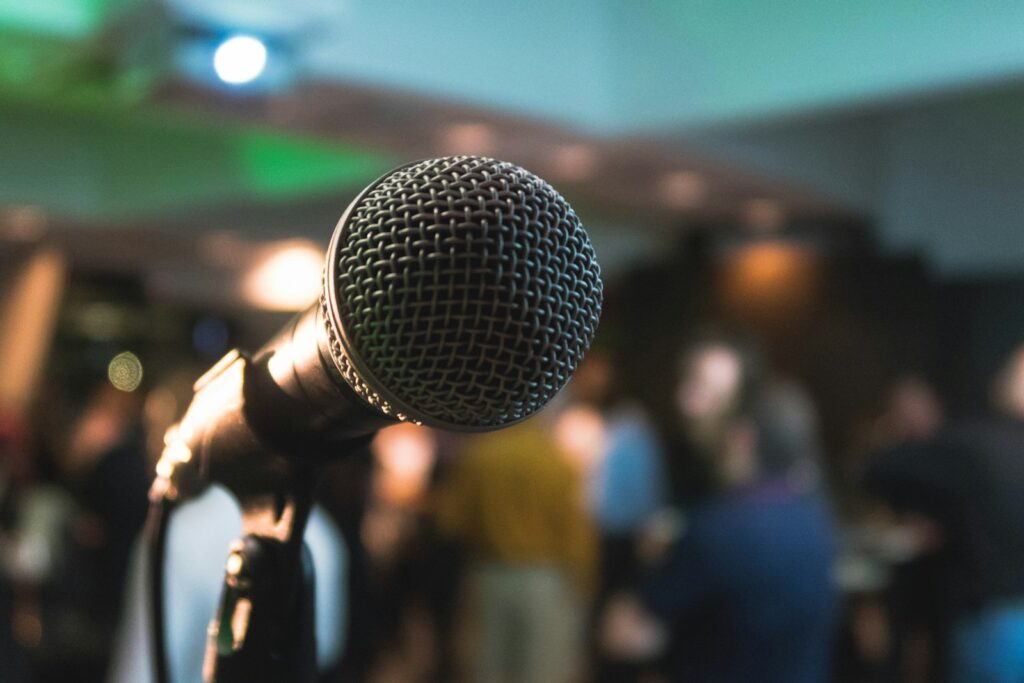 News silver corded microphone in shallow focus photography